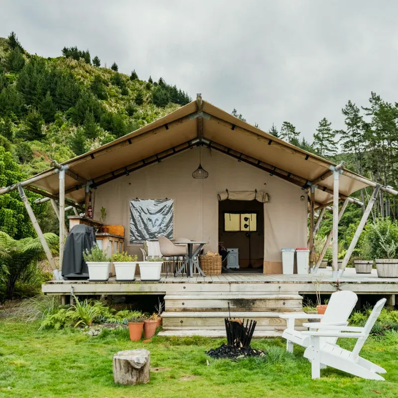The safari tent and its deck, seen from the lawn
