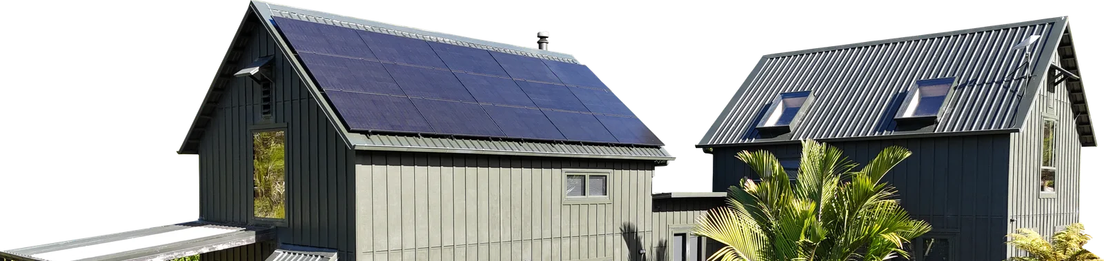 The Eco-Lodge in the sun, its roof covered edge to edge in solar panels
